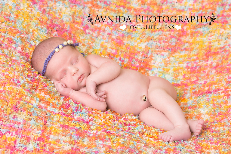Coco on a colorful blanket in Newborn Photography Somerville NJ