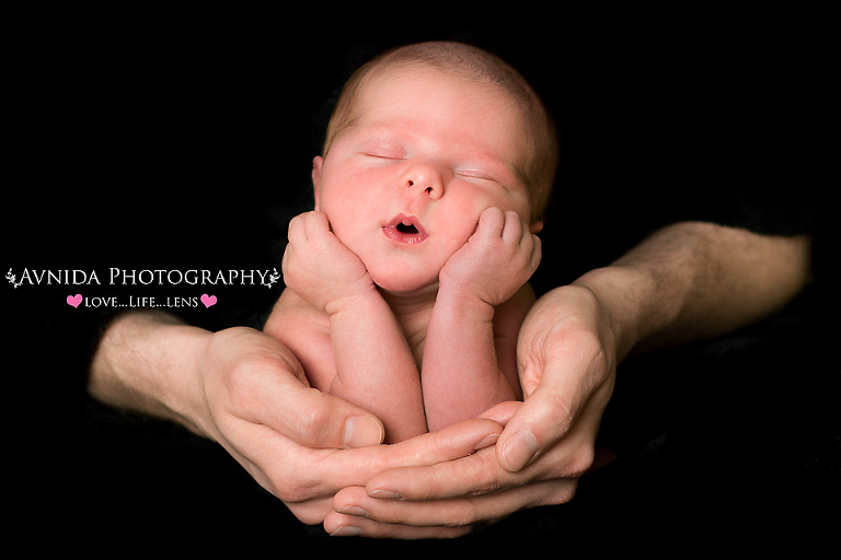 Coco with hands on her chin in Newborn Photography Northern New Jersey