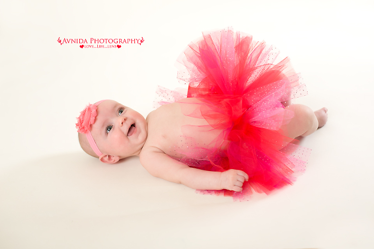 Juliette in a red tutu in arlington tx baby photographer