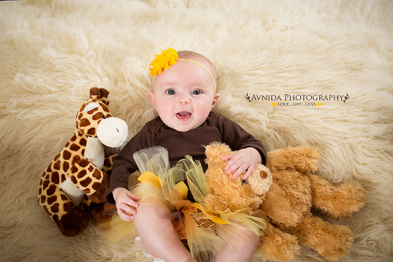 Juliette with stuffed animals in dallas tx baby photographer