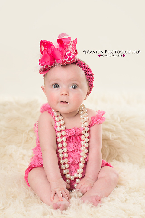 Juliette in a big pink bow in dallas tx baby photographer