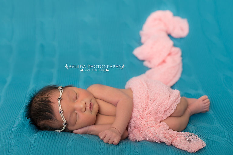 Karter in a pink wrap in frisco newborn baby photographer