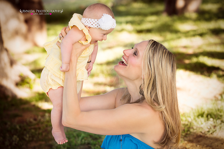 mommy and me photography session basking ridge new jersey - mommy raising the little princess in the air (color)