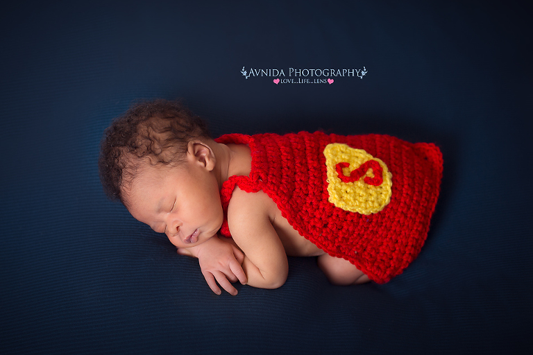 Newborn Photography - Little Superman tired after a long day