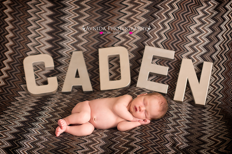 caden with letters spelling his name behind him for his Newborn Baby Photography Mahwah New Jersey session