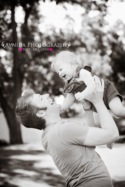 family photography session for one year birthday with dad in the air by by Family Photographer Bridgewater New Jersey