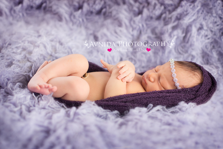 Sweet Madison on a purple blanket for her photo session by Newborn Photographer Clinton New Jersey