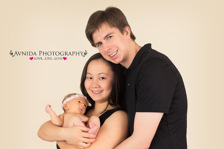 Madison with Mom & Dad for her photo session by Newborn Photographer Flemington New Jersey