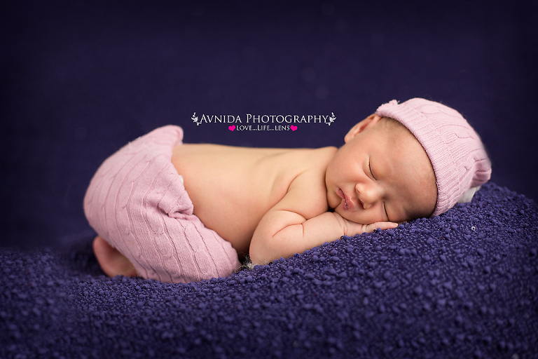 Madison in a cute pink pj for her photo session by Newborn Photographer Clinton New Jersey