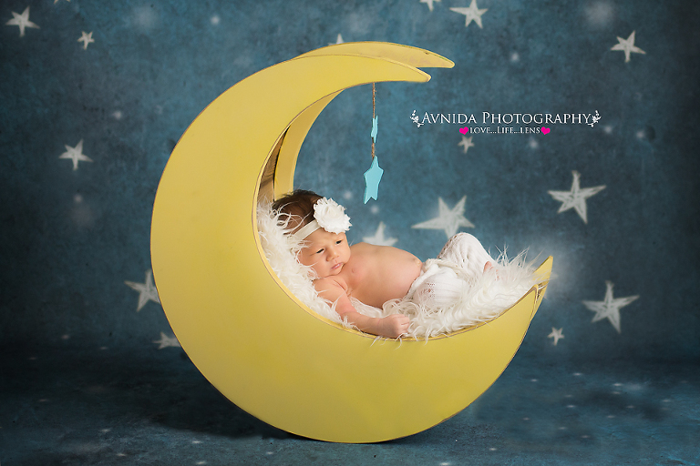 Madison on the moon for her photo session by Newborn Photographer Lebanon New Jersey