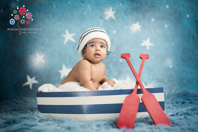 eshaan in the boat for his millburn baby photography new jersey session