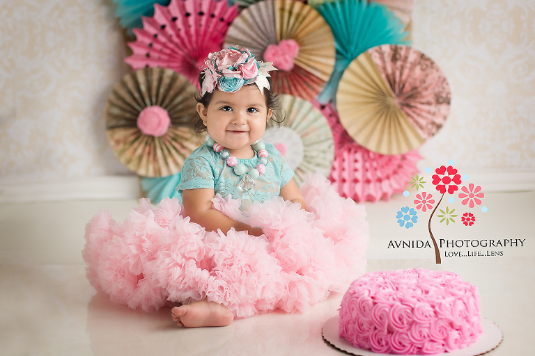 cake smash photography dallas with little Daniella and with the lovely pink cake