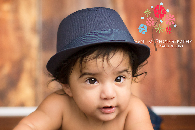 Smiling in a fedora for his 6 Month Baby Photography Mendham New Jersey 