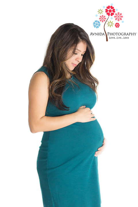 maternity photographer in Denton TX in green dress