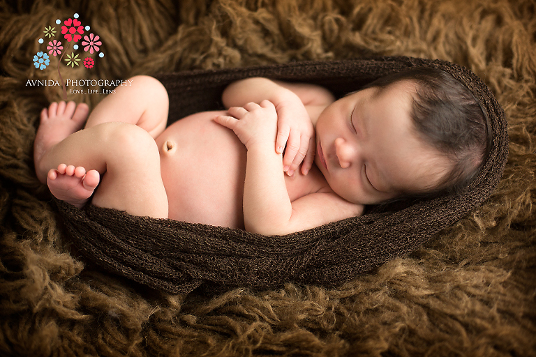 John in a little coccon by  by Clinton Newborn Photographer New Jersey