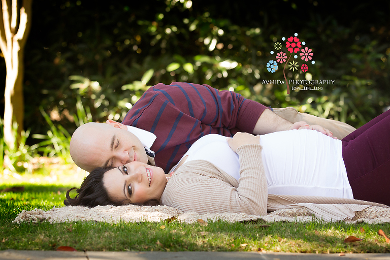 Affectionate touch during the outdoor maternity photography Basking Ridge NJ
