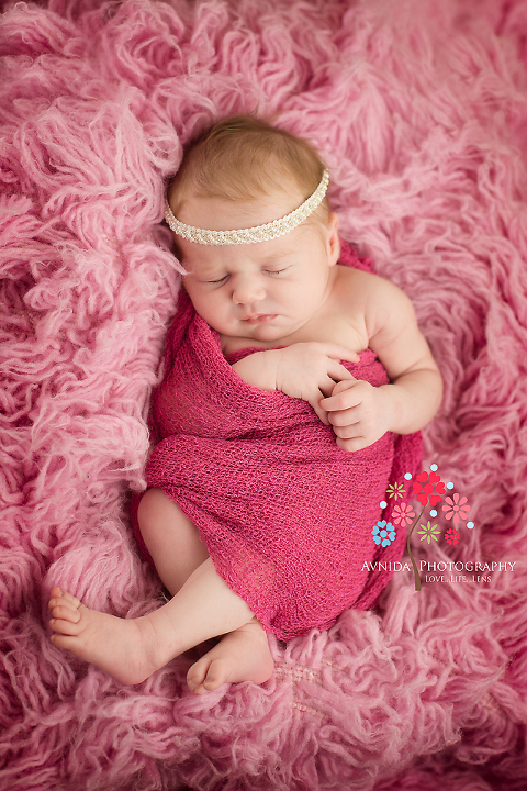 newborn baby photography pictures new jersey of Reagen her looking pretty in pink