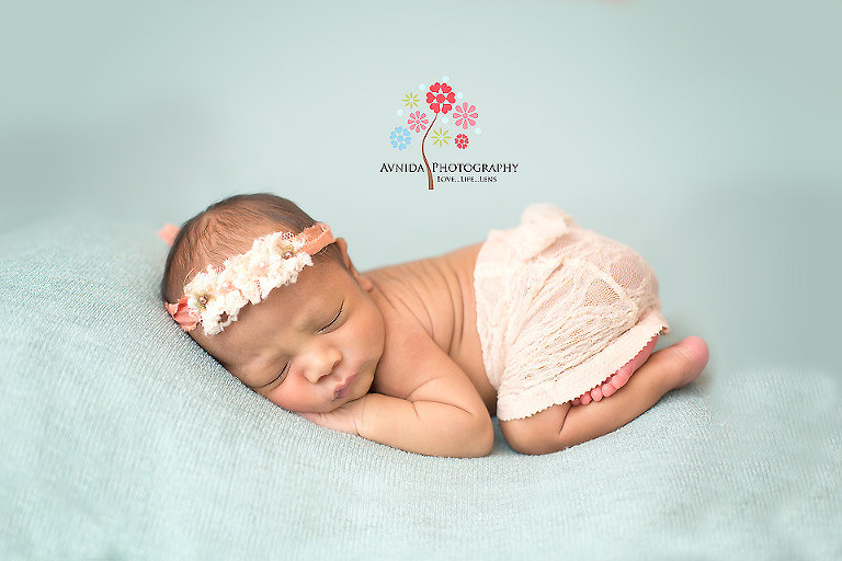 Zoe in green blanket in picture from Newborn Photography Ocean County NJ by www.avnidaphotography.com