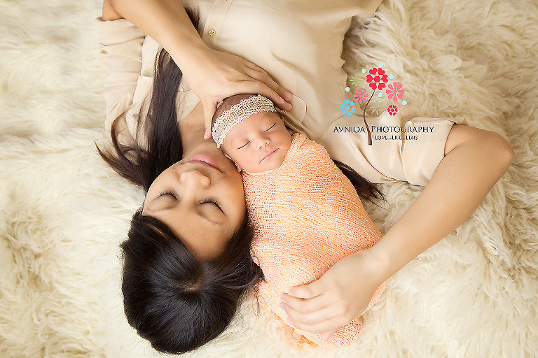 Zoe lying by side of her mommy in picture from Newborn Photography Ocean County NJ by www.avnidaphotography.com