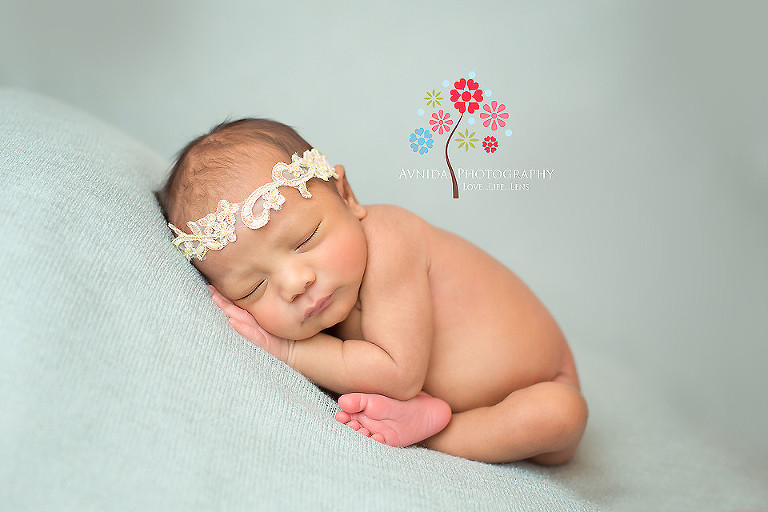 Zoe in green blanket in picture from Newborn Photography Ocean County NJ by www.avnidaphotography.com