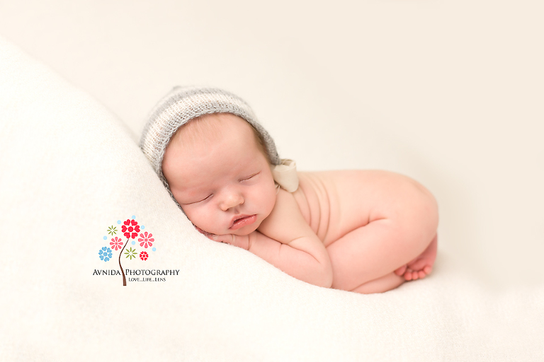 newborn photography basking ridge nj sleeping with hat by www.avnidaphotography.com