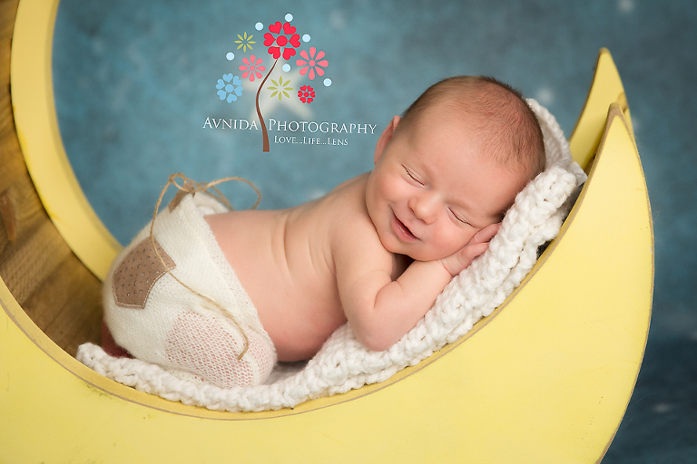 Basking Ridge Bernards NJ newborn photographer, baby sleeping on the moon