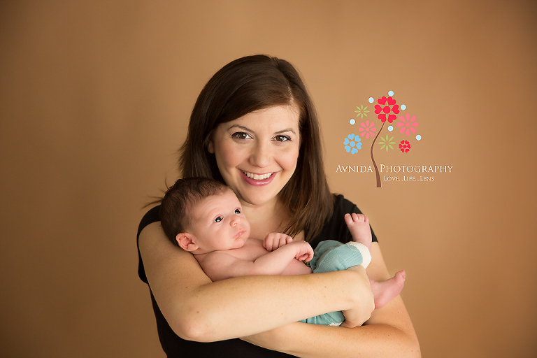 Newborn Photography Hoboken NJ in mom's arms