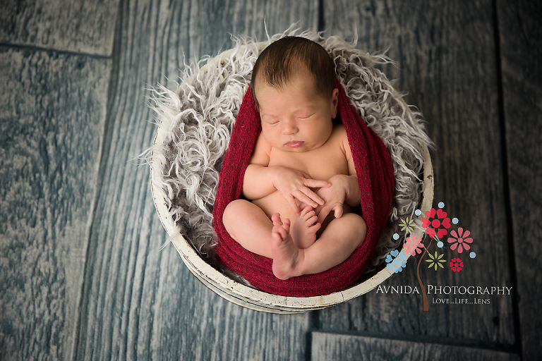 Newborn Photography Millburn NJ; graceful in grey and maroon