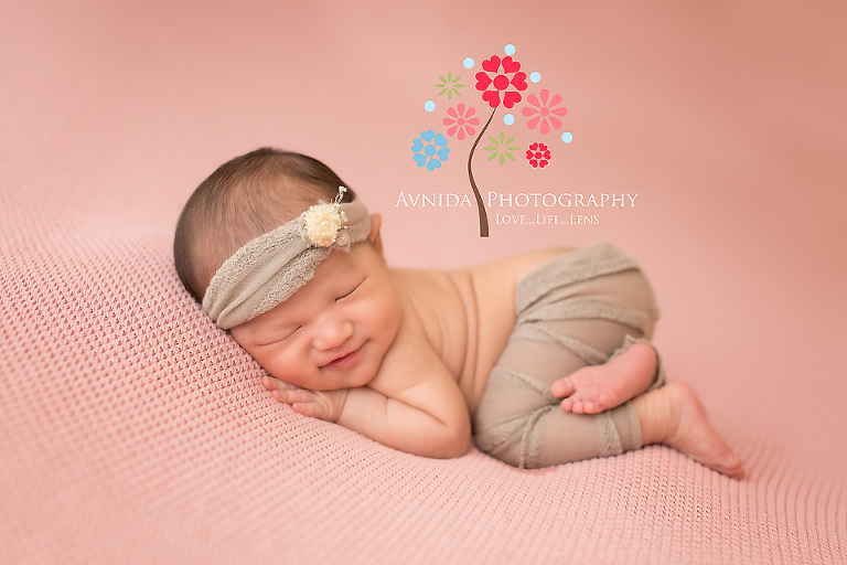 Newborn Photography Bergen County NJ - Someone is happy striking the perfect pose