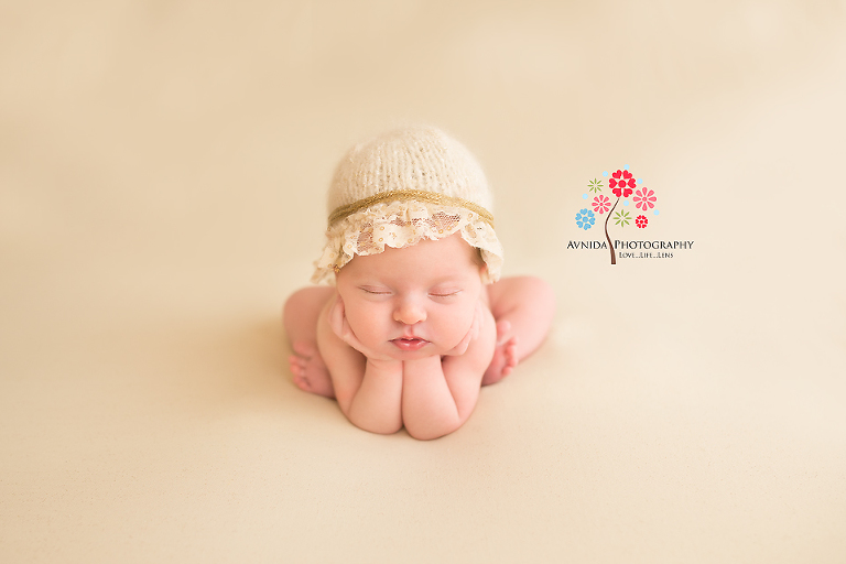 Newborn Photos Basking Ridge NJ - Amelia goes for awesomeness with this perfect pose - not to mention that we like these cute cheeks