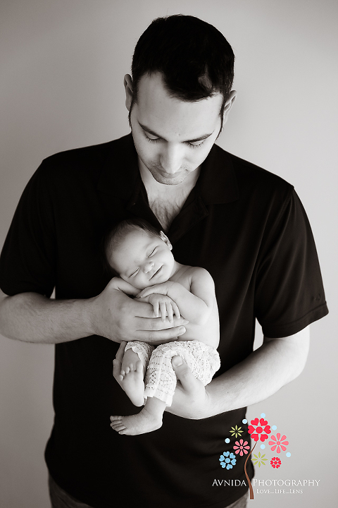 Newborn Photos Basking Ridge NJ - cant get more comfortable and safe than in dads arms