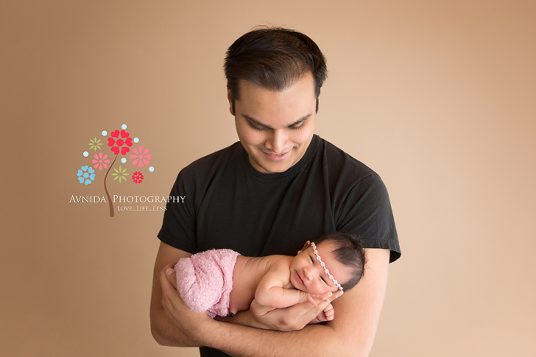 Newborn Photography Central NJ: Dad can't take his eyes off her little princess