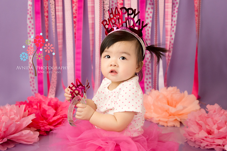 First birthday cake smash - Ah the spiky hair princess with flowers around her