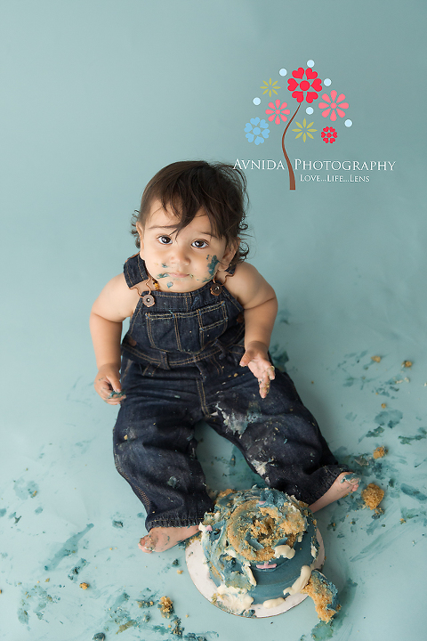 Baby N looks at us with a question mark after smashing the cake for his photoshoot