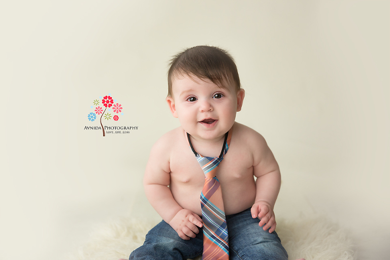 Jacob in a tie, showing off his style and smile