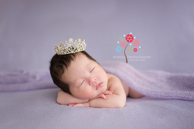With the hand on the chin and the cute pink hat, Emma looks lovely in this photo from her 4 week old newborn photography session