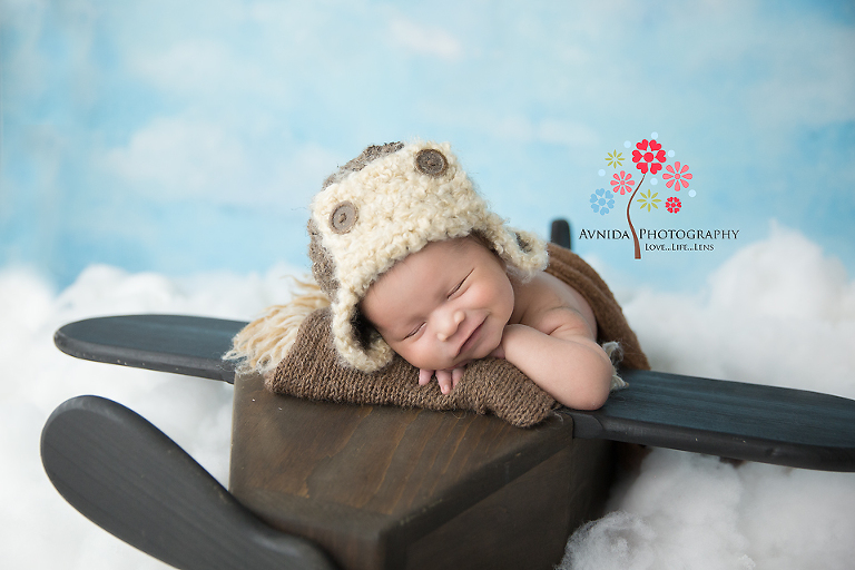 Flying in his own plane for his newborn baby photography session