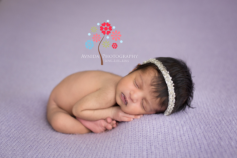 Poses you get with a trained newborn baby girl photographer