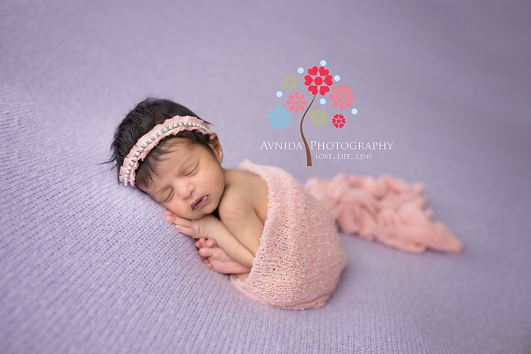 What a perfect combination of colors and smile for Sunheri's newborn baby girl photography session
