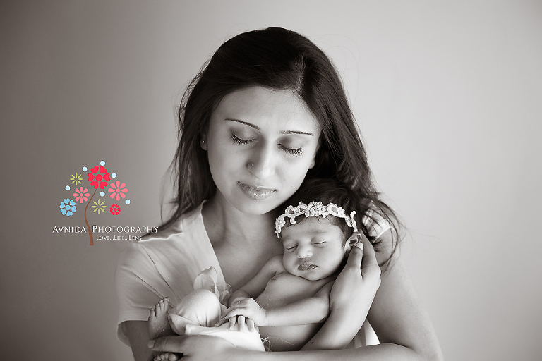 newborn baby girl photography - in mom's arms - the perfect place to be