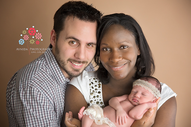 Capturing the love of parents and their little newborn. Photography ideas by Avnida Photography