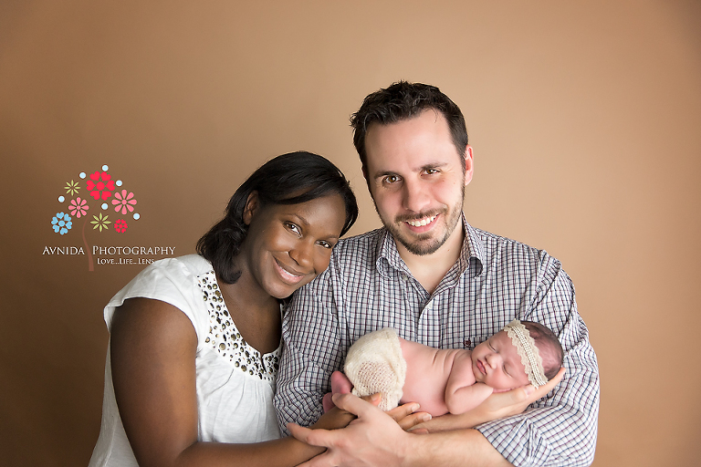Capturing the love of parents and their little newborn. Photography ideas by Avnida Photography