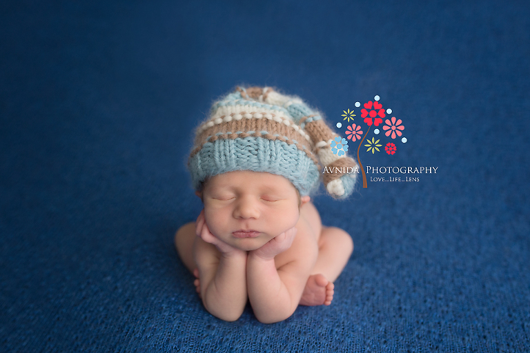 Hands on chin newborn baby boy pictures collection by Avnida Photography, the finest maternity and newborn photographer