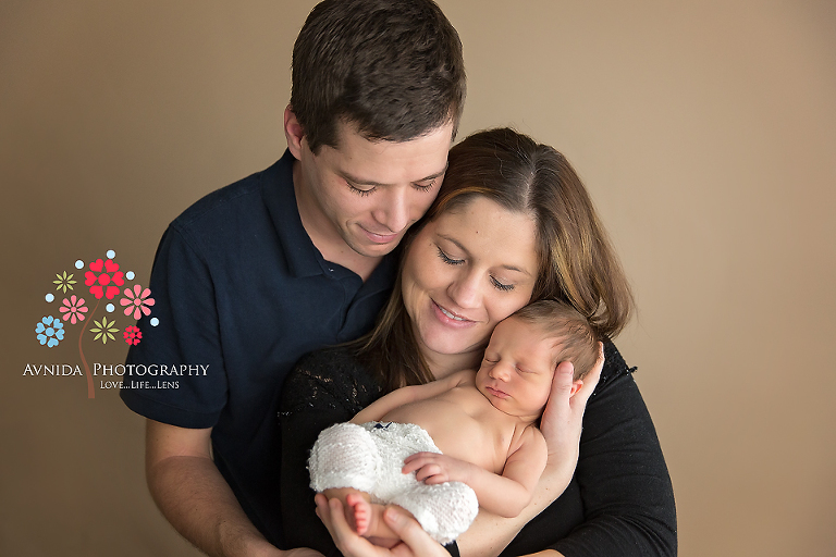 Getting the family together for newborn photography.