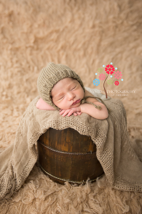 West Orange NJ newborn photographer - In the little basket sleeping so quiet and calm