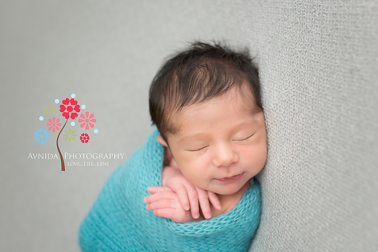 West Orange NJ newborn photographer - Snuggled up and a hint of the smile