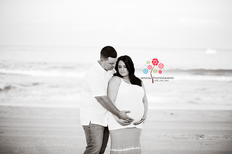 You can almost hear the waves in the beach maternity photos by Avnida Photography