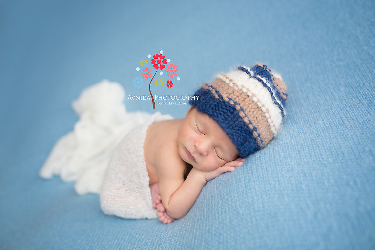 Newborn Boy Photography: Blue and White contrast really well