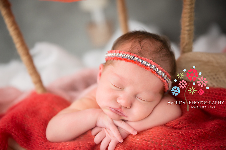 West Orange NJ newborn photographer-A quick closeup of Baby Aeris as she makes her way up to the moon in an awesome hot air balloon- Newborn Photography NJ by Avnida Photography