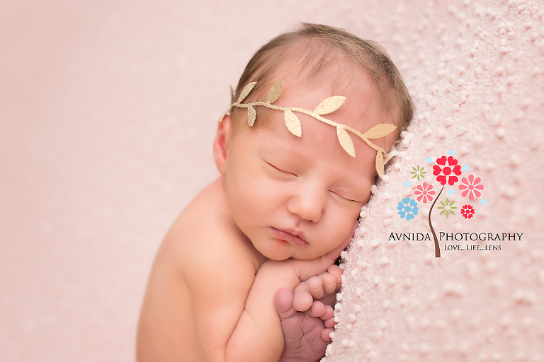 West Orange NJ newborn photographer- Another cute side laying pose by little Aeris - Just 6 days old yet a natural at posing - for the best in newborn photography NJ contact Avnida Photography